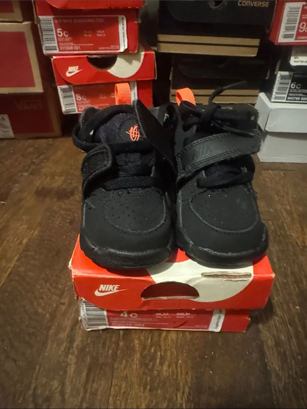 Nike Kids Black Sneakers with Orange Accents